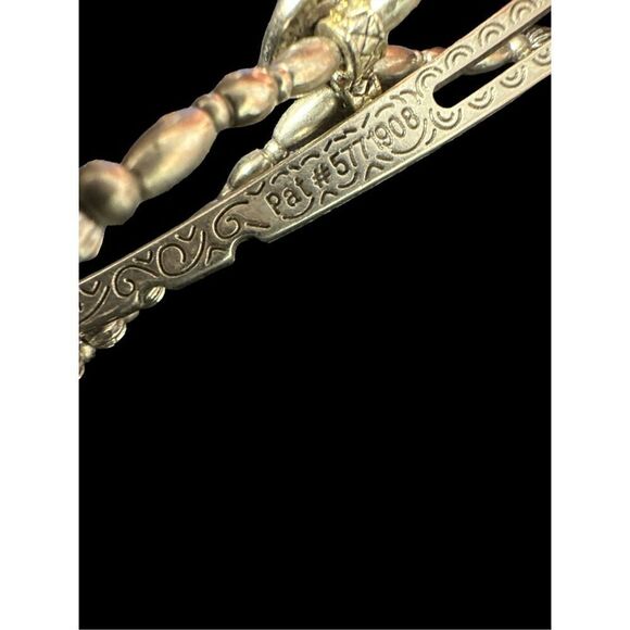Vintage Silver multi use hair clip you can Google www.irose.biz gose MRSP: $65-7